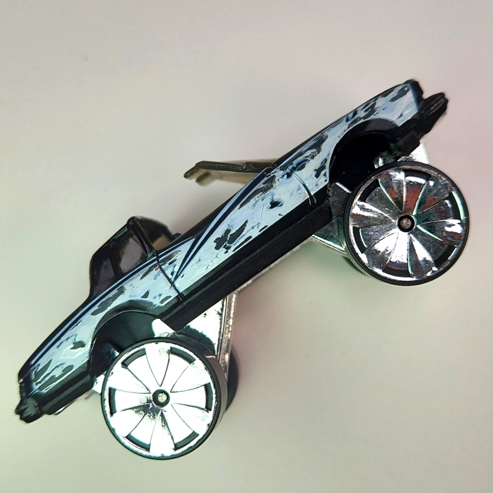 Hot WHEELS HI RAKERS Montezooma Monte Carlo Camoflage Black & White With BLINGS